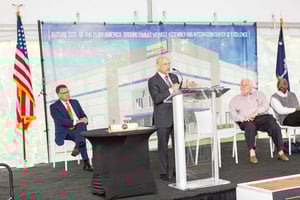 Elbit America President and CEO Raanan Horowitz addresses guests from the lectern at a groundbreaking ceremony on April 6, 2022 in North Charleston, South Carolina.